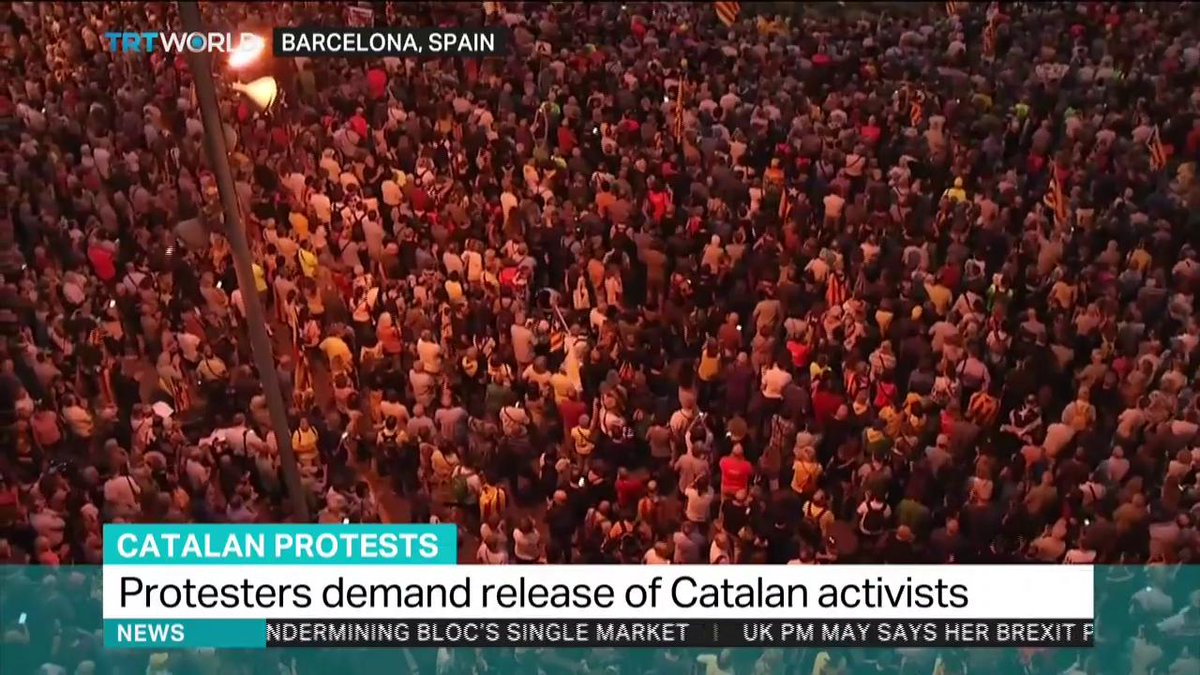 Pro-independence demonstrators have taken to the streets of Barcelona to commemorate one year since the Spanish police raid that lead to the arrest and imprisonment of leaders of Catalonia's main pro-independence movements   